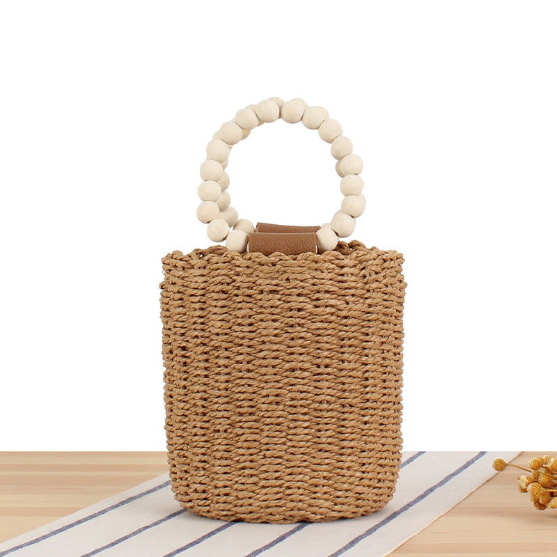 Natural Woven Bucket Bag with Wooden Bead Handle – Boho Chic Handcrafted Summer Purse