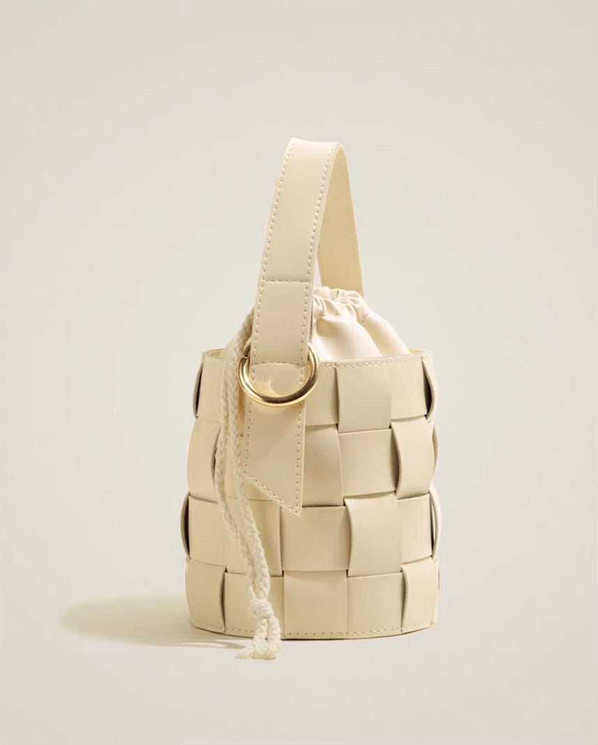 Modern Woven Bucket Bag with Ring Handle – Faux Leather Cylinder Handbag