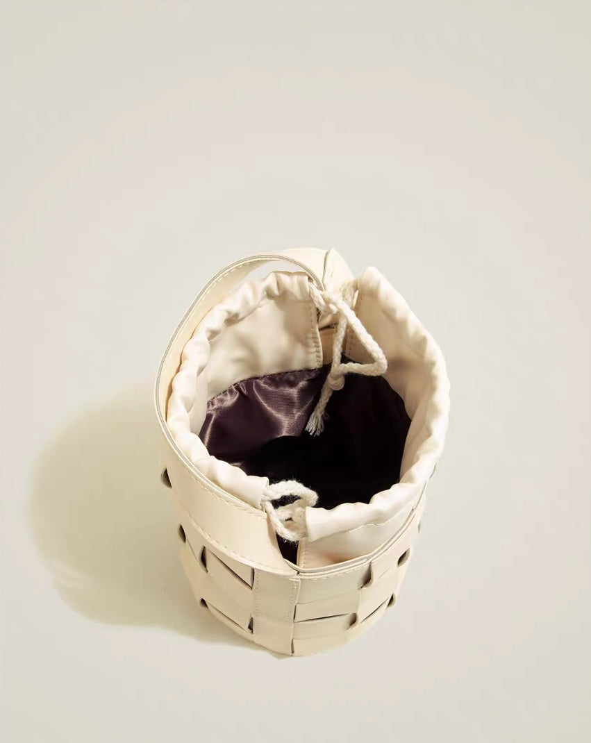 Modern Woven Bucket Bag with Ring Handle – Faux Leather Cylinder Handbag